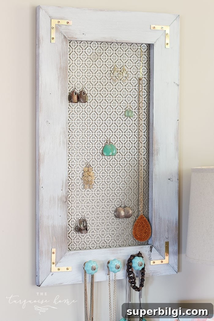 How to Build a Stylish DIY Industrial Jewelry Organizer 4 Stained and lightly painted rustic frame for jewelry organizer