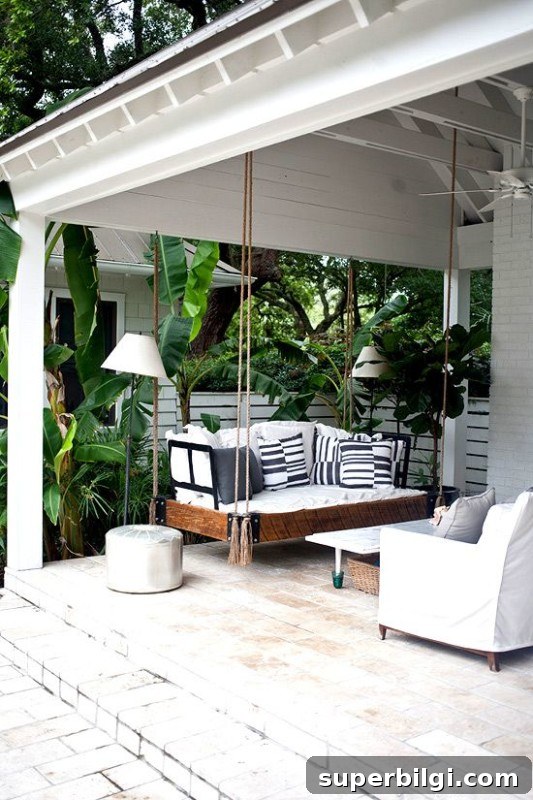 Front Porch Decorating Ideas to Boost Curb Appeal 9 Front porch daybed and seating