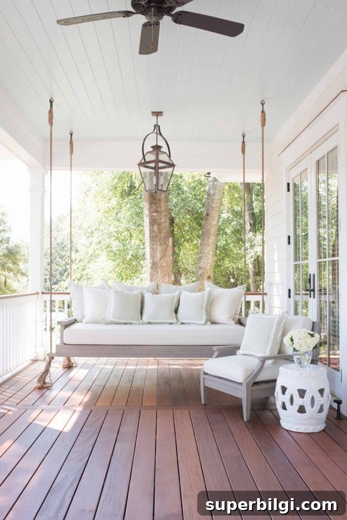 Front Porch Decorating Ideas to Boost Curb Appeal 5 Outdoor daybed and haint blue ceiling
