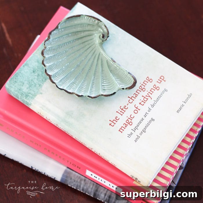 Coastal Summer Mantel Decorating Ideas 9 Favorite summer books to read! | Simply Beachy Summer Mantel at theturquoisehome.com