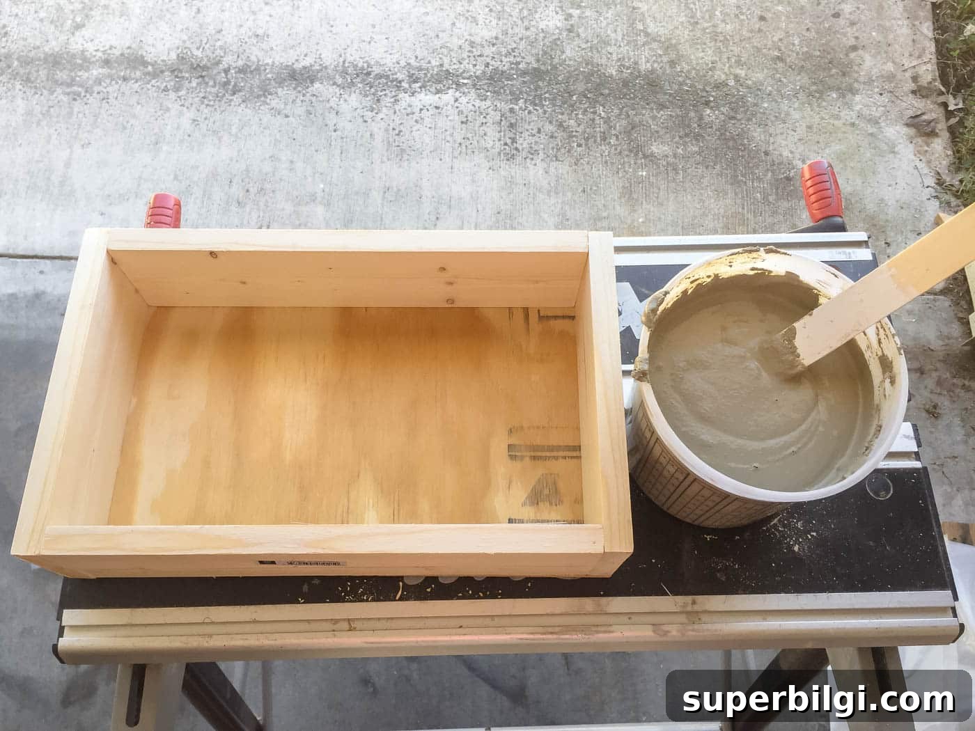 DIY Concrete Tray with Dock Cleat Handles Tutorial 9 mixed concrete to make a tray.