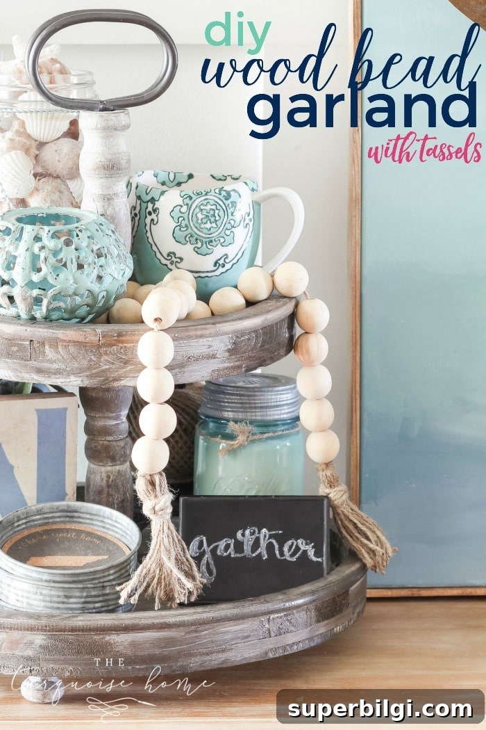 Super cute DIY Wood Bead Garland with Tassels is so easy and fun to make! Cheap, too!!