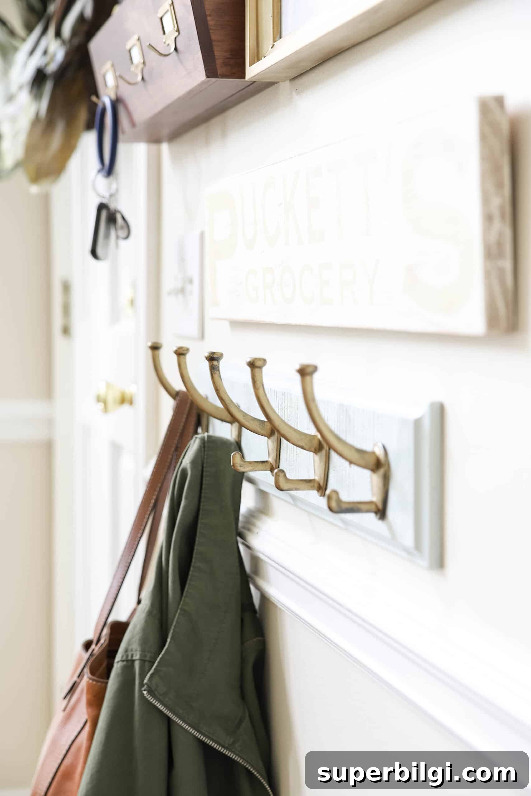 20 Mudroom Ideas for a Stylish, Functional Entryway 4 wall hooks in mudroom