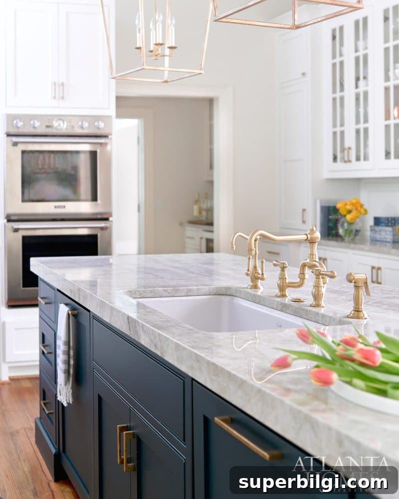 Navy Kitchen Island with brass sink faucet hardware.