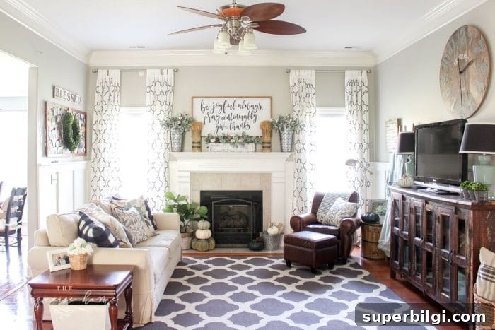 Simple farmhouse fall mantel with a DIY wooden sign