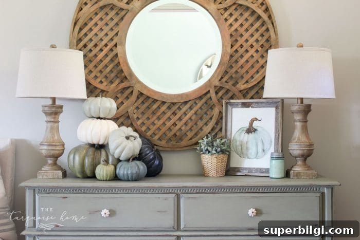 Neutral Fall Entryway and Kitchen Decor Ideas 11 such a simple fall vignette in the entry way ... love the blues and greens!