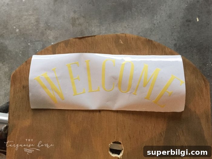 DIY Lighted Pumpkin Candy Holder: Halloween Decor 12 Use vinyl letters to create a welcoming message for your DIY Lighted Pumpkin Candy Holder.