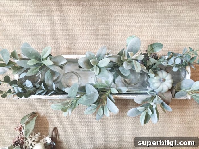 Create a Stunning Faux Foliage Table Centerpiece 6 Arranged faux foliage centerpiece