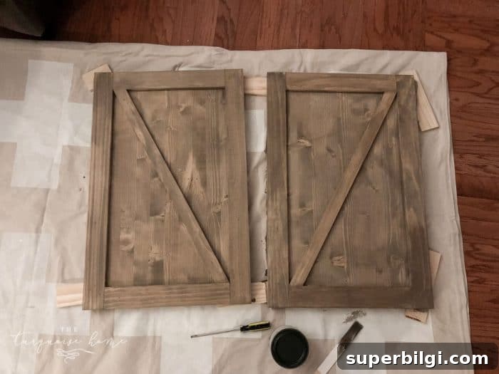 DIY Farmhouse Media Console Table Plans and Tutorial 14 Making the sliding barn doors