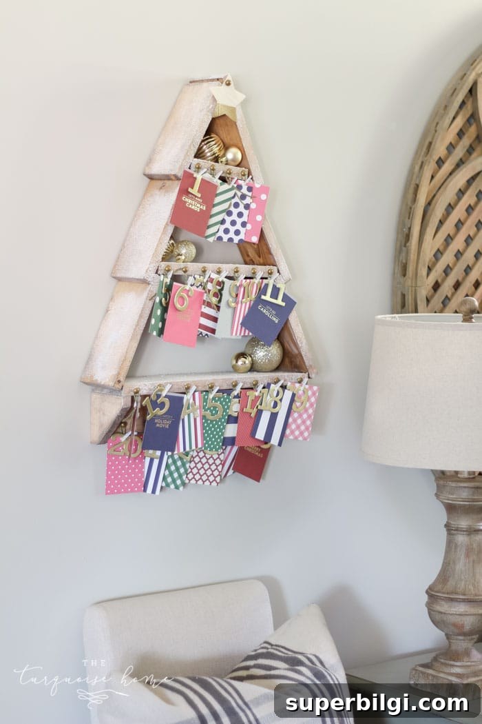 DIY Snowy Christmas Tree Shelf and Advent Calendar Tutorial 2 The most adorable DIY snowy Christmas Tree Shelf lends itself to the perfect spot for an advent calendar. LOVE it!!