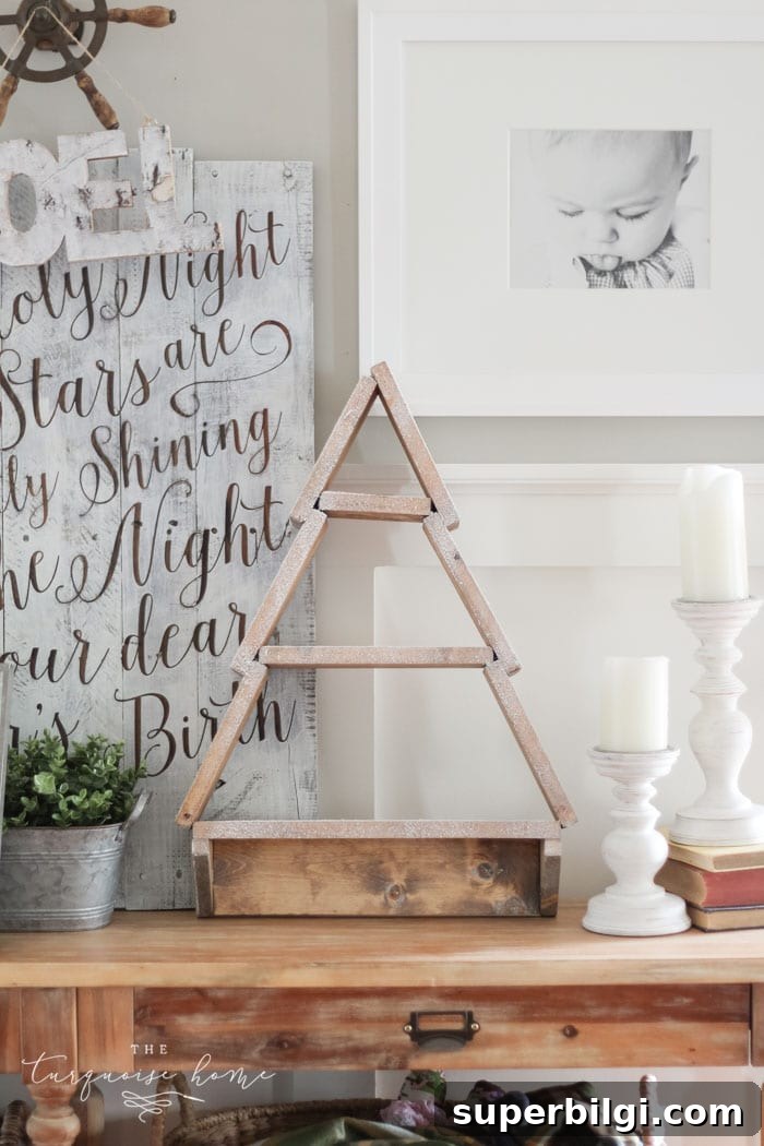 DIY Snowy Christmas Tree Shelf and Advent Calendar Tutorial 11 The most adorable DIY snowy Christmas Tree Shelf lends itself to the perfect spot for an advent calendar. LOVE it!!