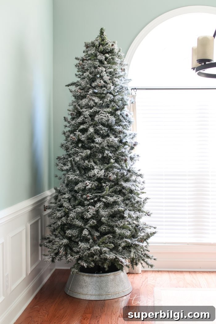 How to Flock a Christmas Tree: DIY Snowy Tree Tutorial 10 Completed flocked Christmas tree ready to decorate.