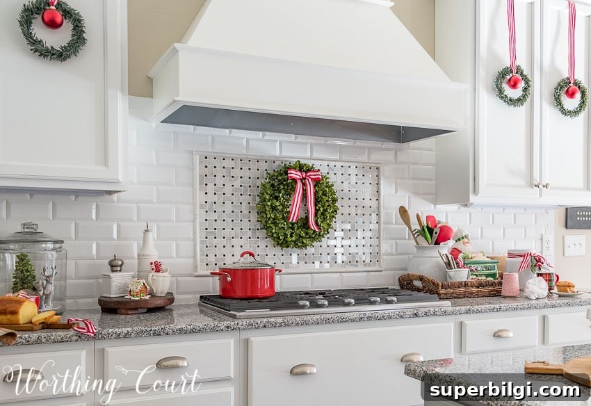 Cozy Farmhouse Christmas Kitchen Decor Ideas 6 Boxwood Christmas Wreath over Stove