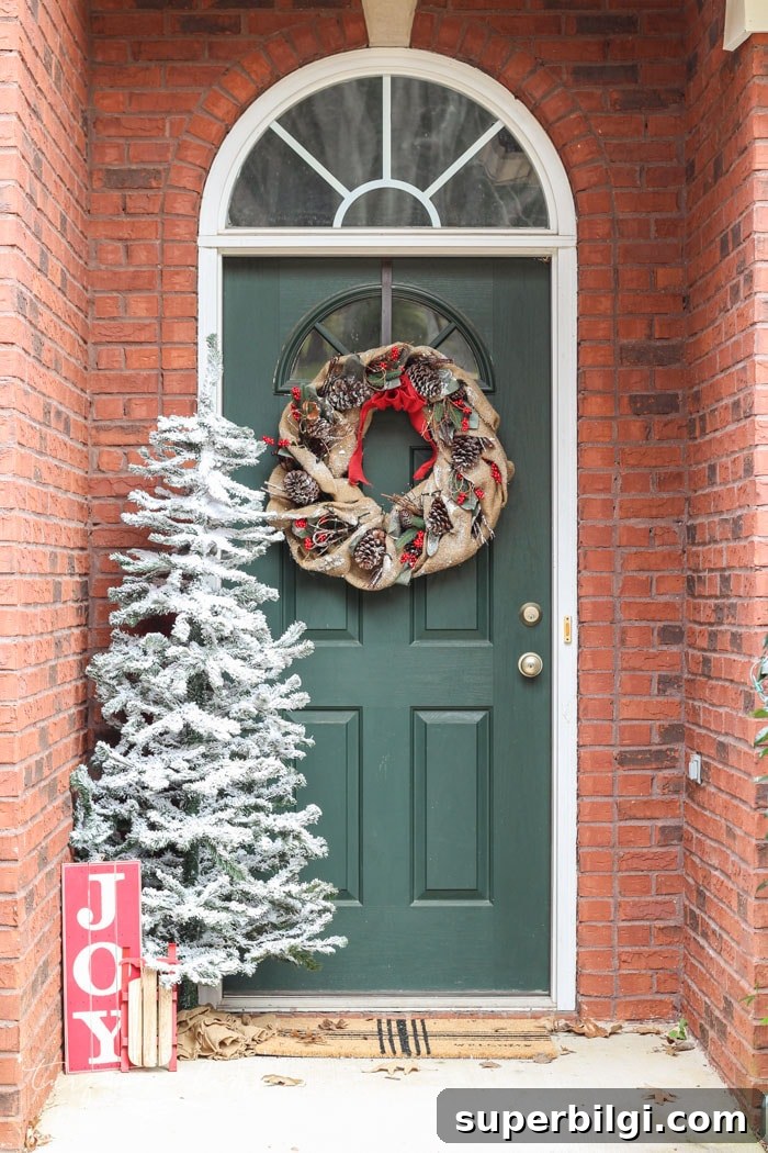 Neutral Christmas Entryway Ideas for a Warm Welcome 2 A simple Christmas front stoop