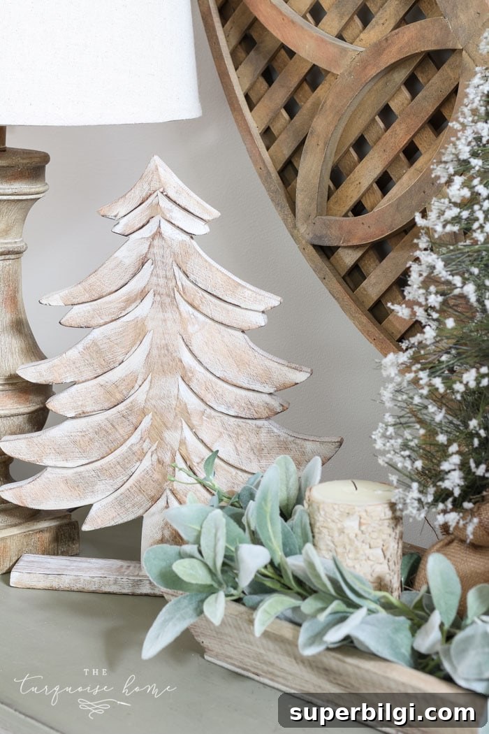 Neutral Christmas Entryway Ideas for a Warm Welcome 10 A neutral Christmas entry way - not too fussy or fancy!