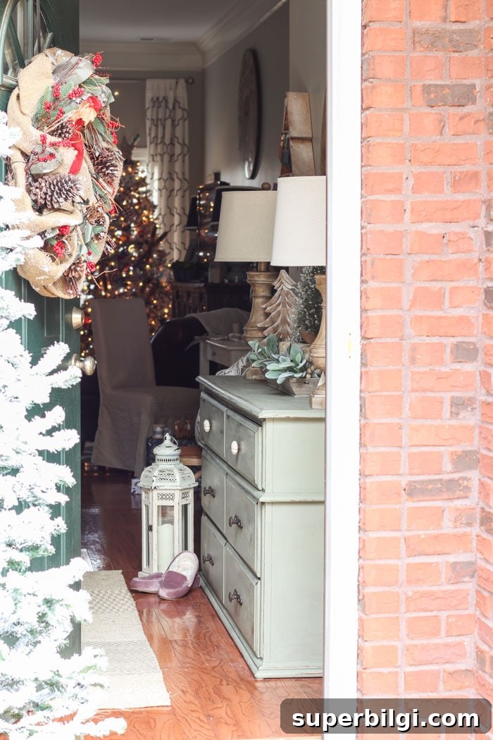 Neutral Christmas Entryway Ideas for a Warm Welcome 4 A simple Christmas front stoop