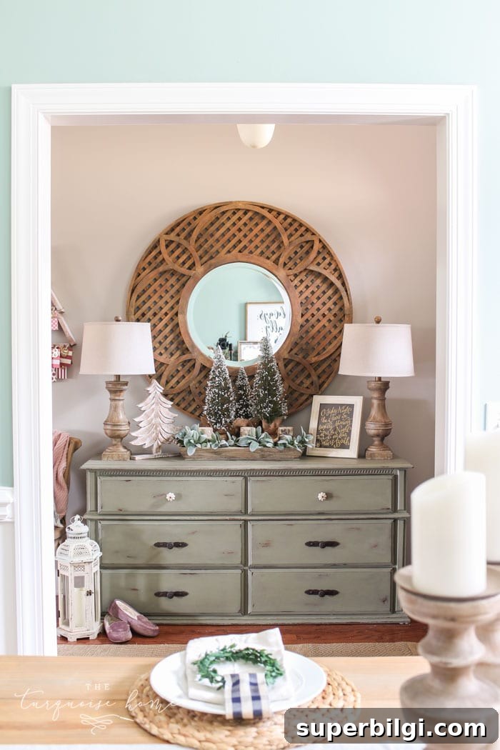 Neutral Christmas Entryway Ideas for a Warm Welcome 8 A neutral Christmas entry way - not too fussy or fancy!