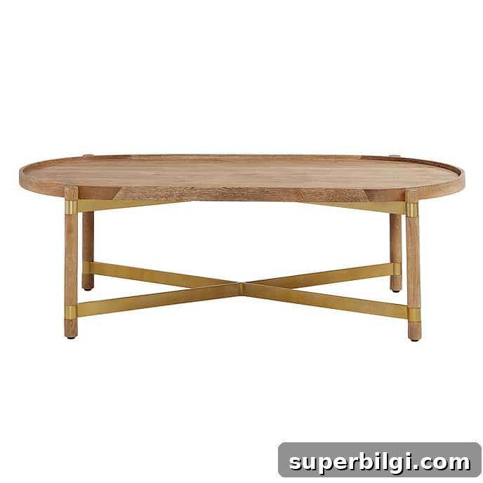 Coffee Table Decor Ideas to Elevate Your Living Room 17 oval wood and metal coffee table