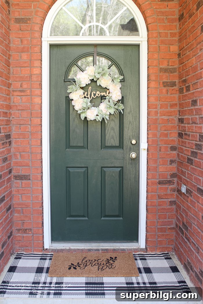 Customize a Charming DIY Doormat: Personalize Your Welcome Mat 2 DIY "Love Grows Here" Doormat - easy to customize for cheap!
