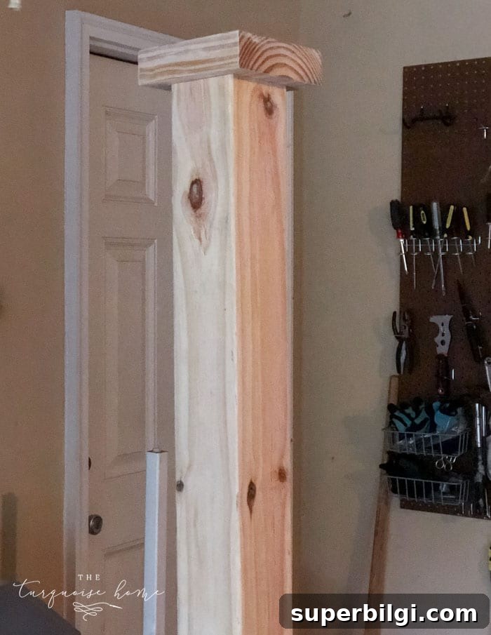 DIY Wooden Coat Rack: Step-by-Step Build Guide 11 Add a scrap piece of 2 x 6 to the top as a decorative piece. | DIY Coat Rack | #buildyourownathome #diyproject #diy #buildlikeagirl