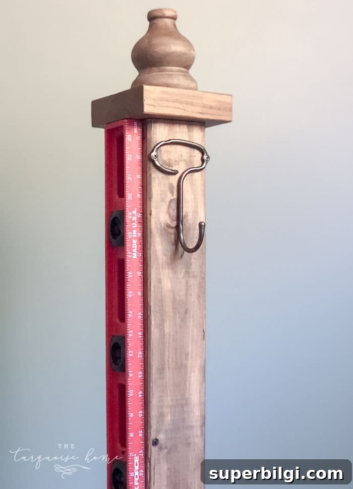DIY Wooden Coat Rack: Step-by-Step Build Guide 14 Add decorative hooks to your standing coat rack. | DIY Coat Rack | #buildyourownathome #diyproject #diy #buildlikeagirl