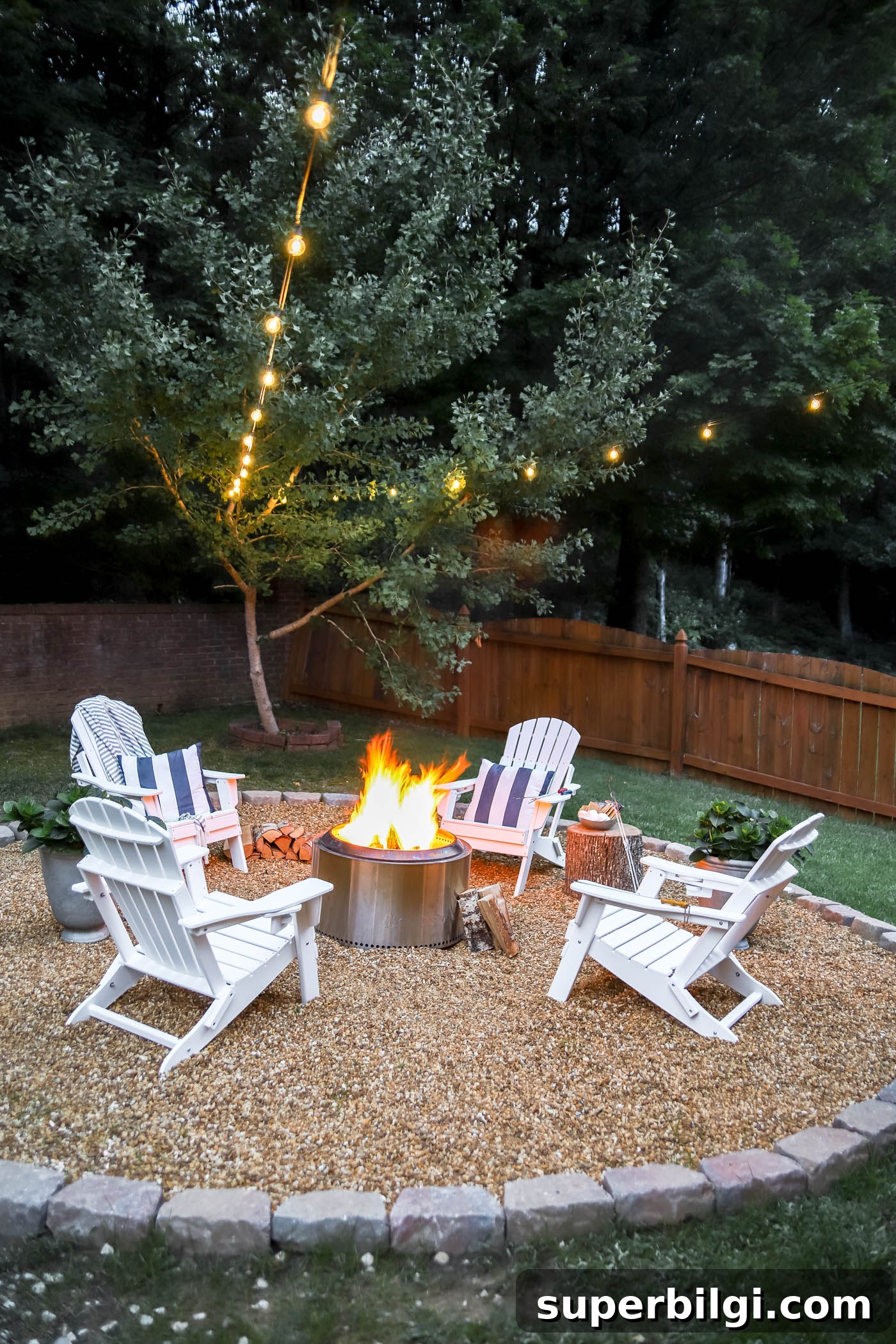 Stunning and Practical Outdoor Living Space Designs 9 White Adirondack chairs and DIY fire pit area