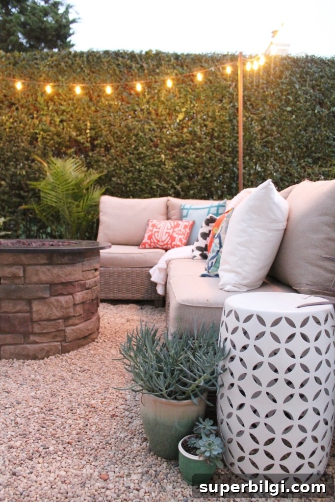 Stunning and Practical Outdoor Living Space Designs 4 Hamptons backyard barbecue with sofa and string lights