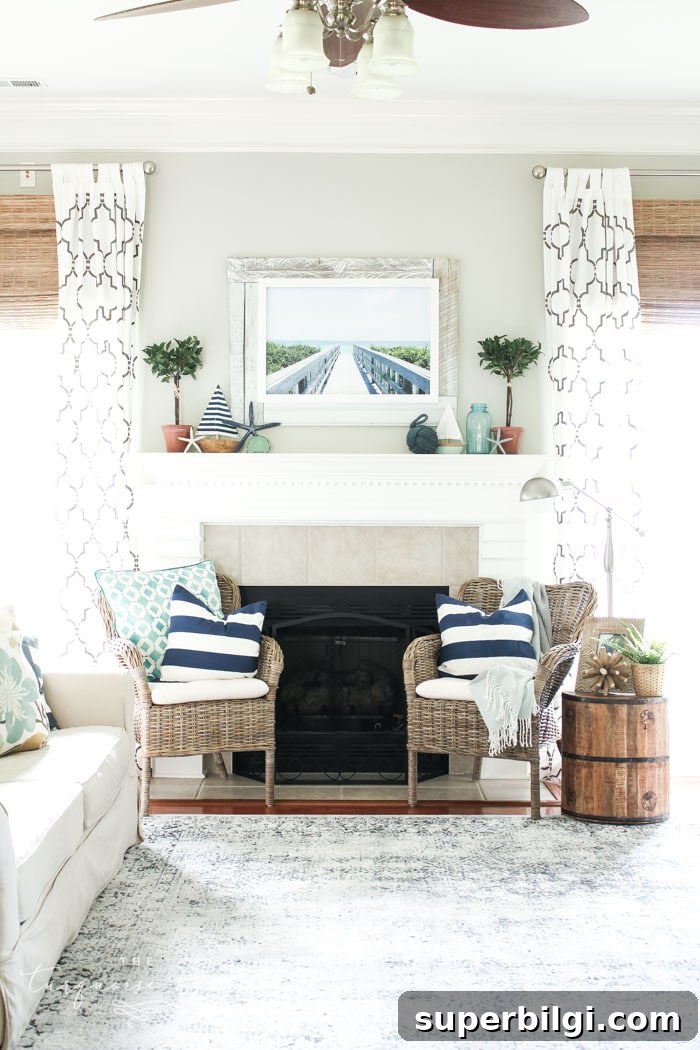 Add a little nautical charm to your living space with these simple coastal summer mantel decor ideas. Featuring DIY beach canvas art, blue & white starfish, textured sailor's knot and cheerfully striped sail boats, this mantel looks great for the seasonally inspired.