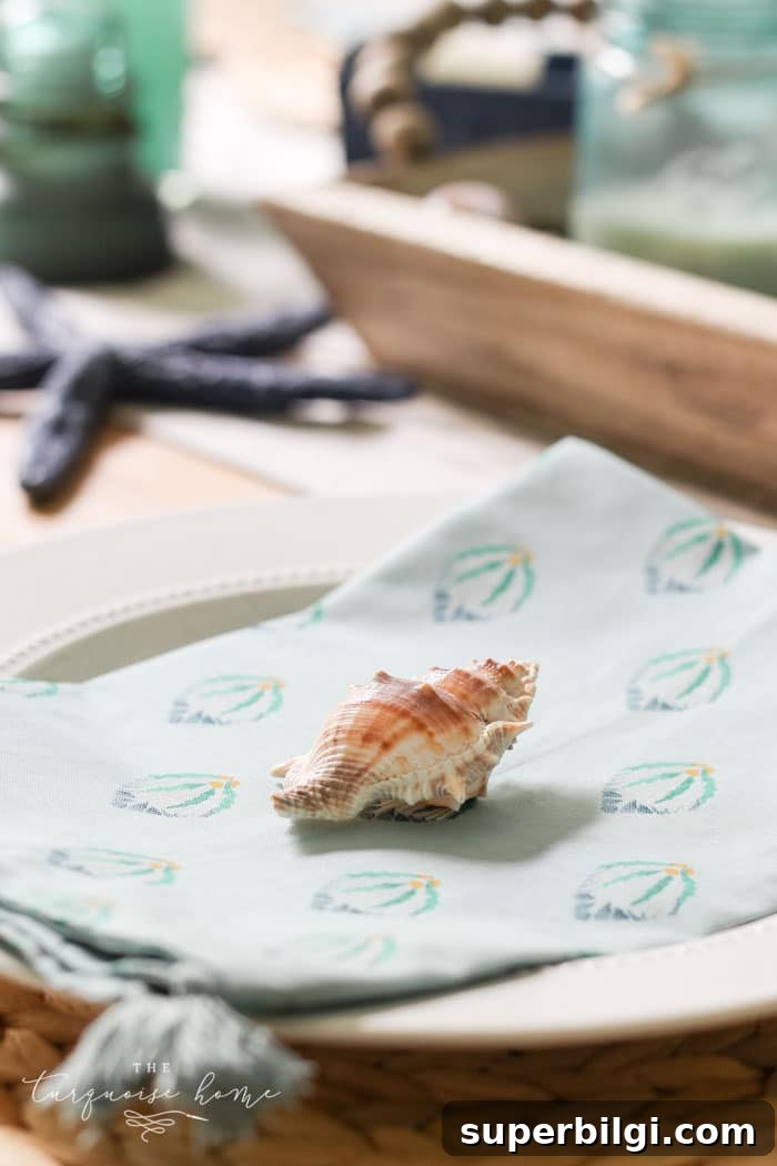 Coastal Dining Room and Entryway Decor Ideas 7 Coastal decor in the dining room with beautiful beachy blues and these coastal napkins from the Opal House line at Target!