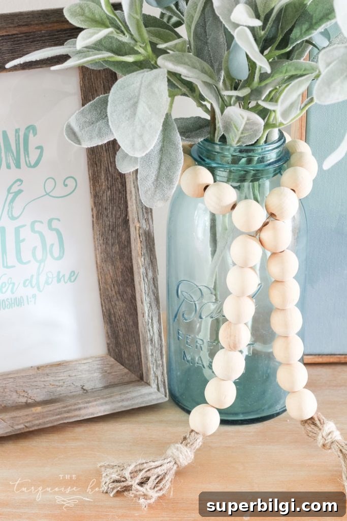 60+ DIY Christmas Gift Ideas for 2025 11 DIY Wood Bead Garland with Tassels