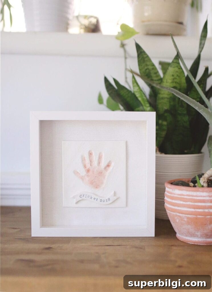 60+ DIY Christmas Gift Ideas for 2025 23 clay handprint keepsake frame