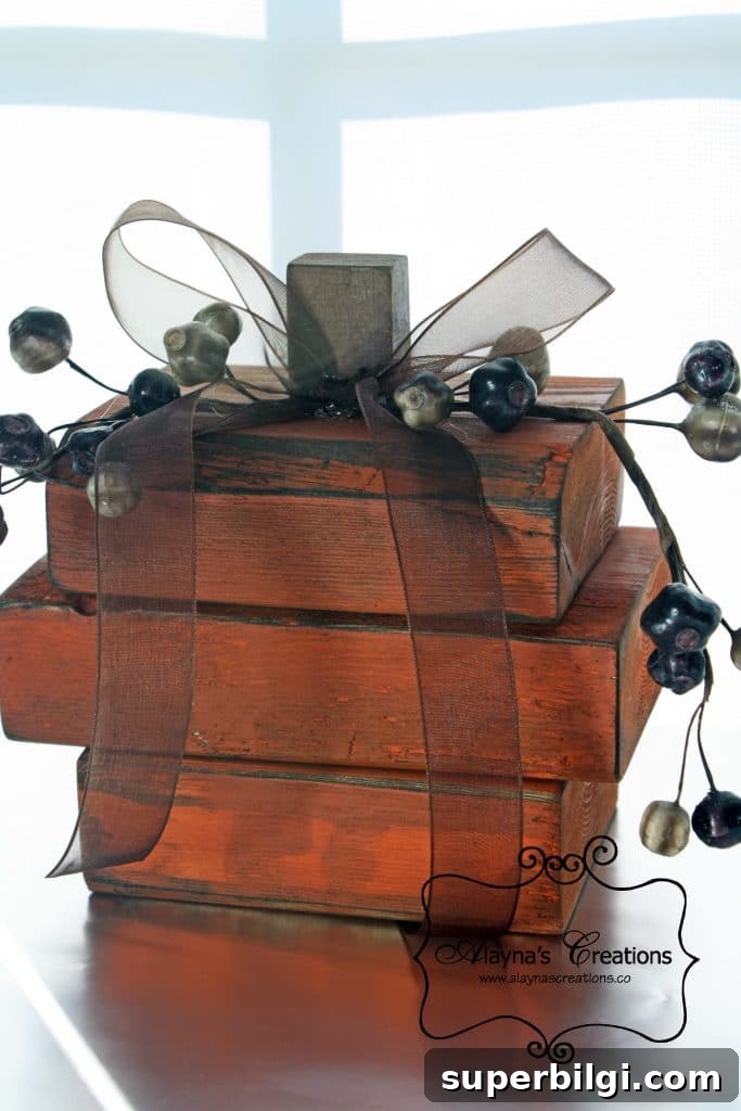 13 Charming Wooden Pumpkins for Fall Decor on Any Budget 4 DIY 2 x 4 Wooden Pumpkin