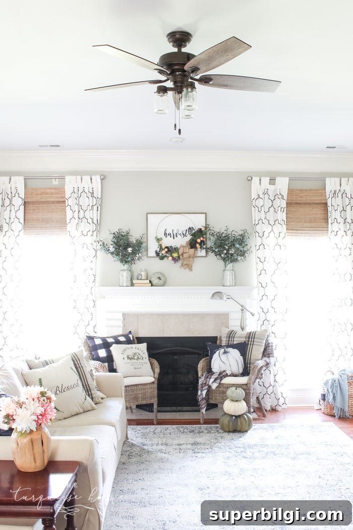 Farmhouse Ceiling Fans That Add Rustic Charm 7 This gorgeous Joanna Gaines' style farmhouse ceiling fan won't break the bank! #farmhouseceilingfan #ceilingfan #farmhouse #joannagaines #theturquoisehome #diyhomedecor