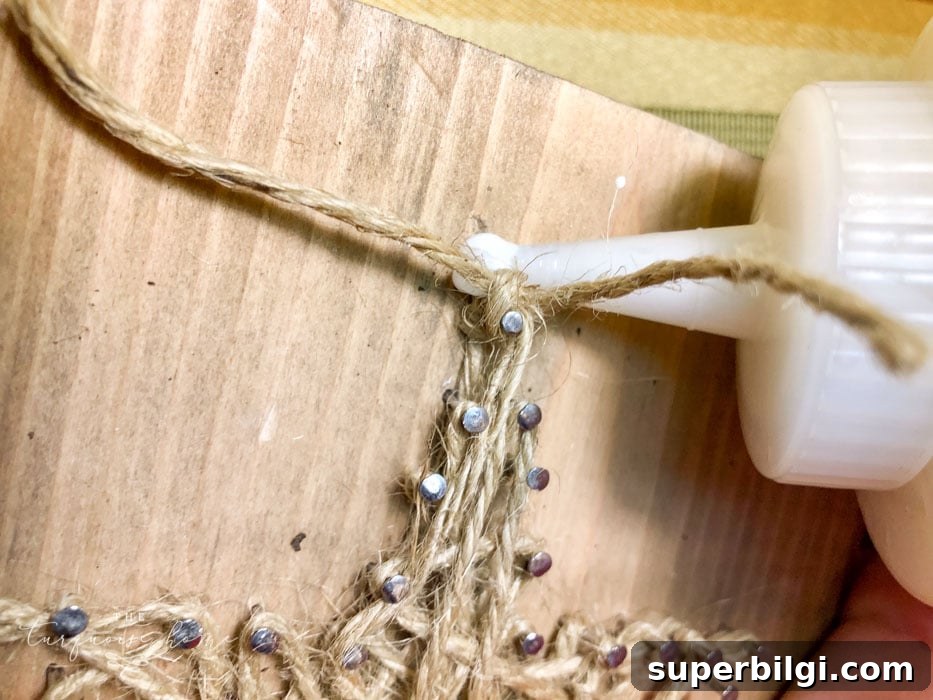 gluing the last string on nail art