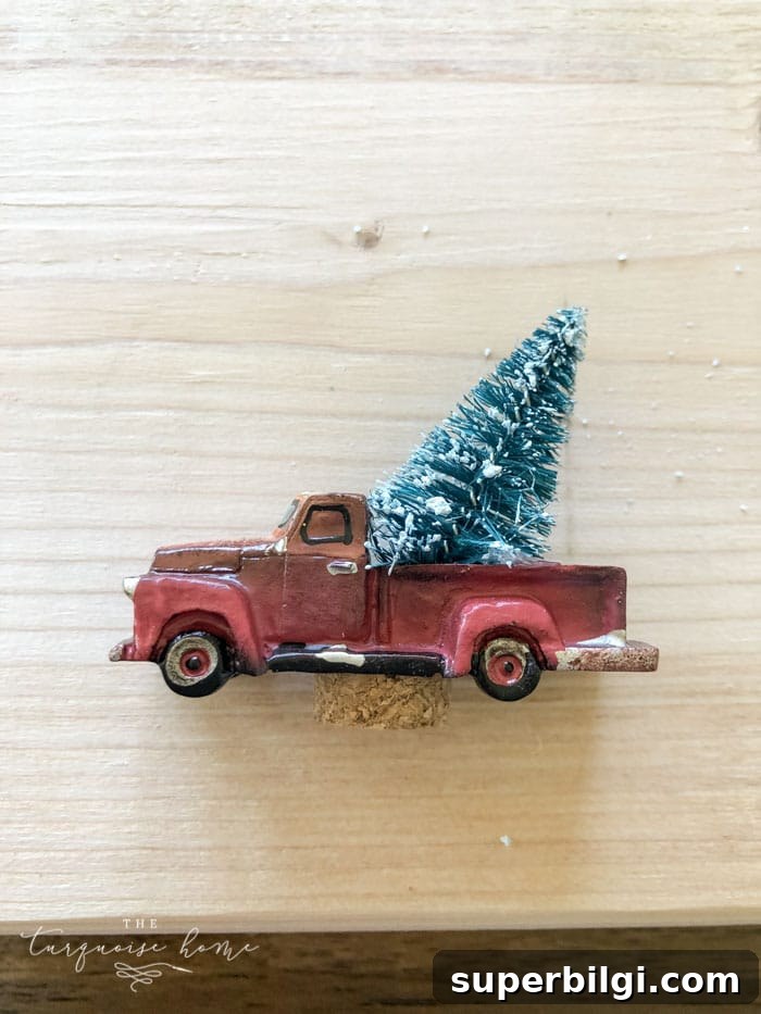 How to Make a Mason Jar Snow Globe Ornament for Christmas 8 Fit bottle brush tree into back of truck