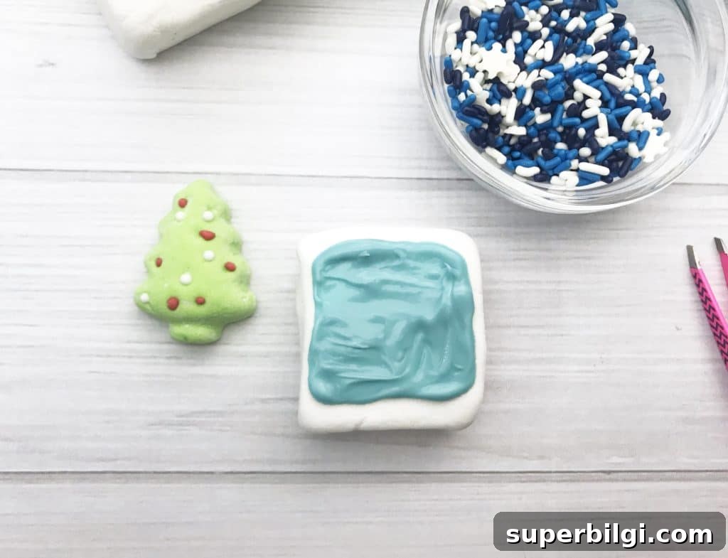 Pour the blue candy on the marshmallow.