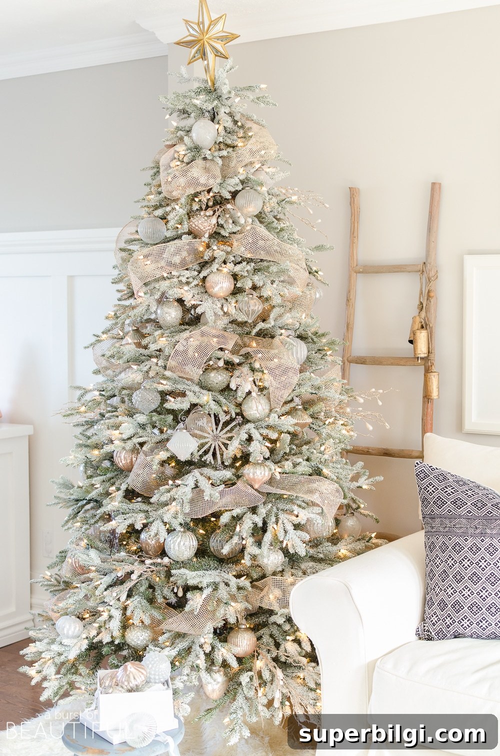 Stunning Flocked Christmas Tree Ideas for a Snowy Look 11 neutral flocked Christmas tree with blush, gold and silver ornaments.