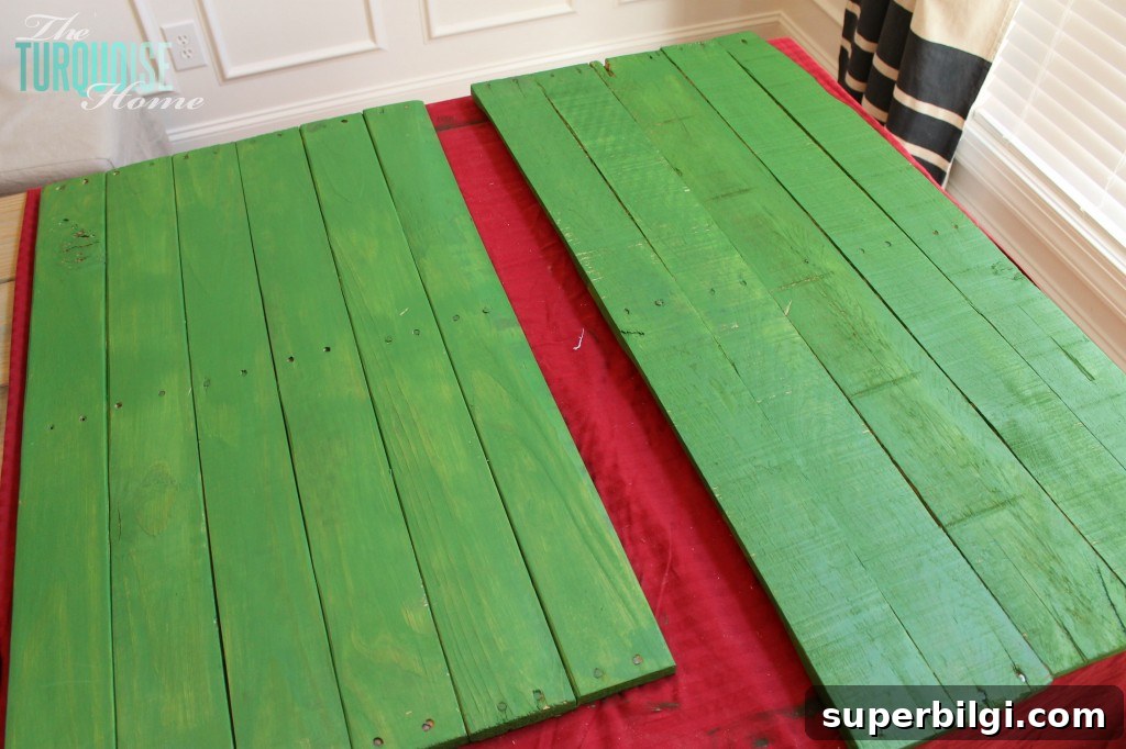 painted green pallet signs