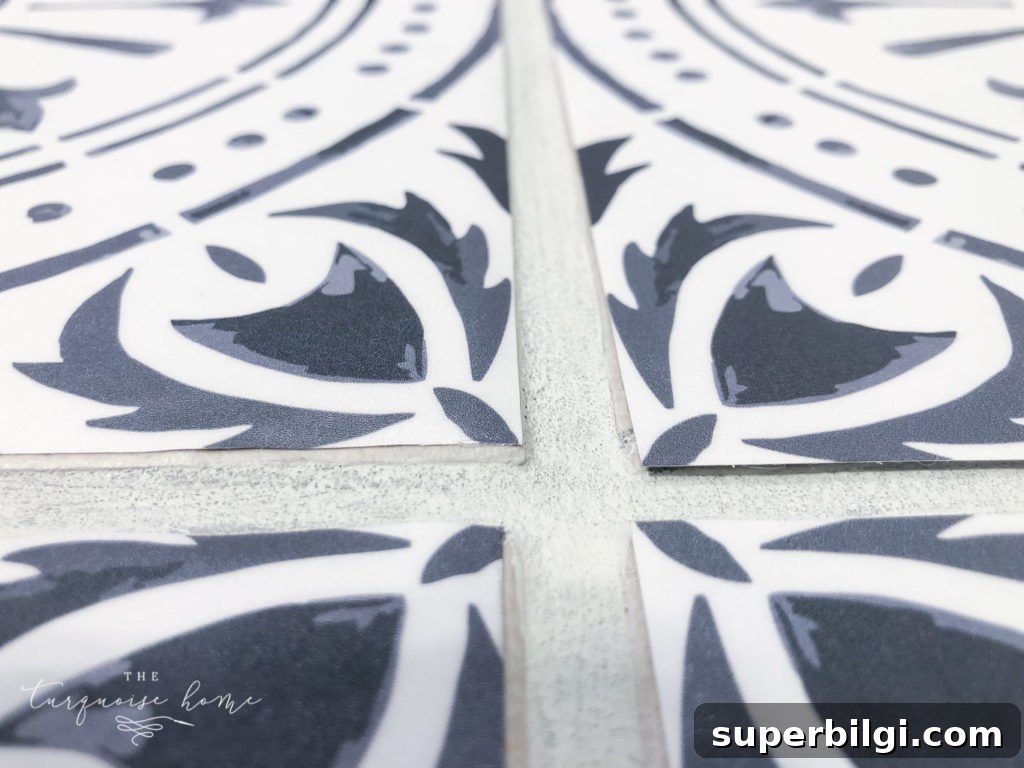 DIY Peel and Stick Vinyl Tile Flooring --> on the right they are regular sized and the left ones are trimmed
