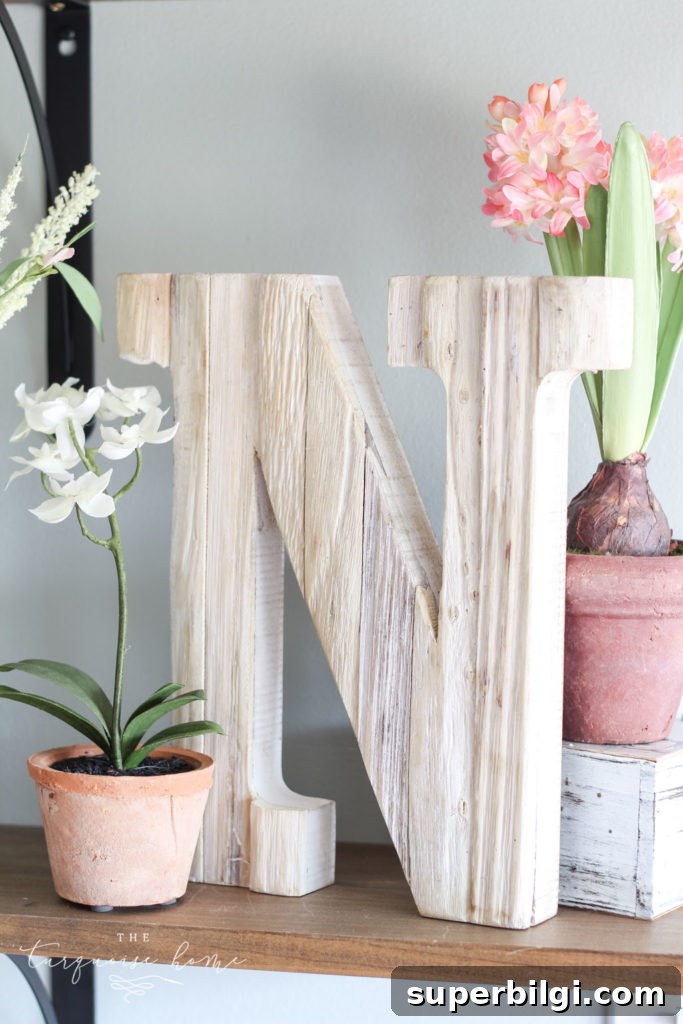 Flower Shop-Inspired Spring Home Tour and Decor Ideas 14 Faux orchids and other flowers make for gorgeous spring decor!