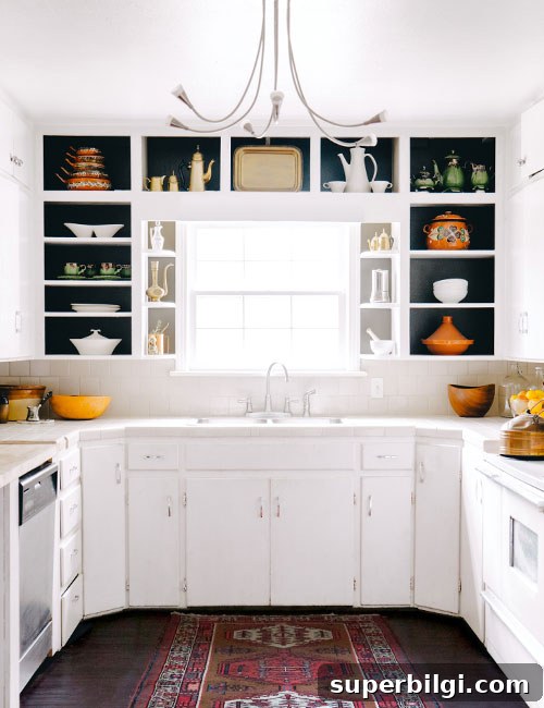 DIY Kitchen Cabinet Makeovers on a Budget 9 Remove the kitchen cabinet doors to give the kitchen an updated look!