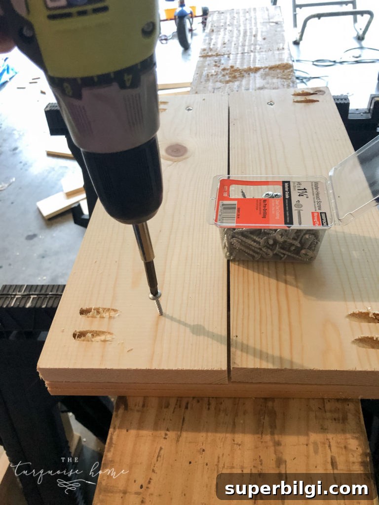 How to Build a Wooden Planter Box Step-by-Step 6 DIY Wood Planter -- Screw a screw into the back of the 1x6 panels into the 1x3 boards to make it extra secure