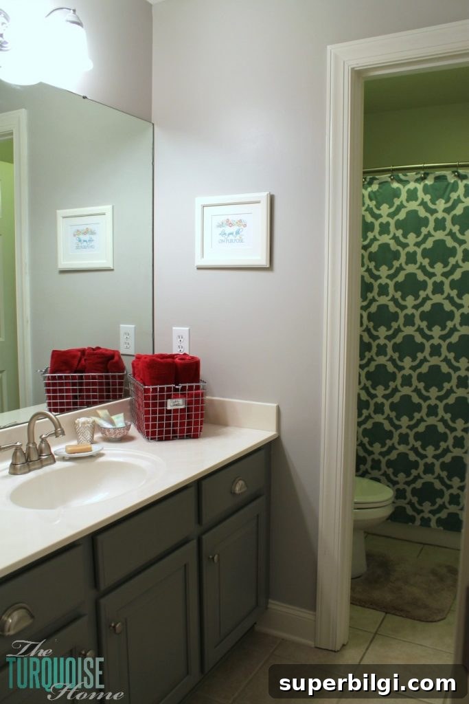 Traditional-Americana Guest Bathroom Update: painted walls, cabinets, new hardware and a punch of color!