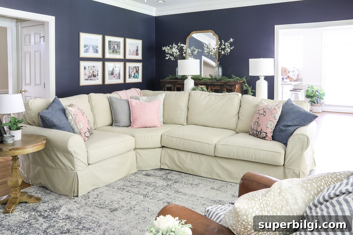 Splurge or Save: What to Spend on Furniture and Decor 4 Sectional Sofa in a Navy Living Room