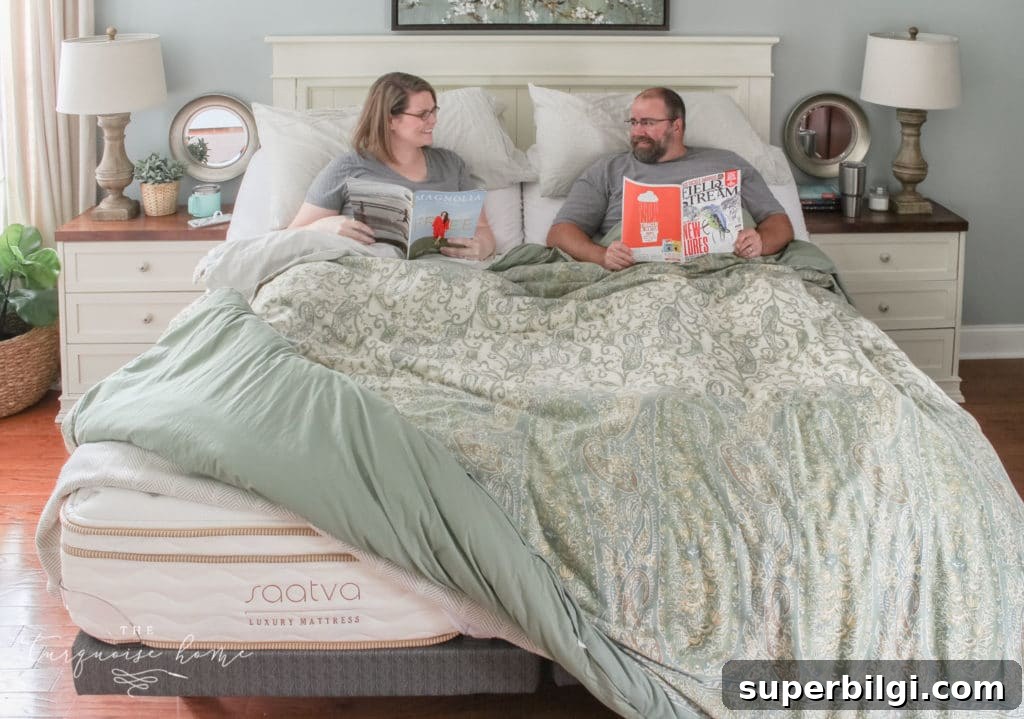 Sleeping in Separate Beds: Benefits and Saatva Mattress Review 9 Couple smiling on bed; happy with mattress choice