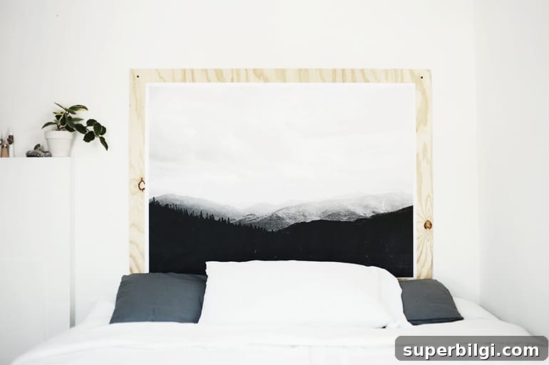 How to Make a Headboard: 13 DIY Ideas to Build Your Own 7 How to make a headboard: 13 Beautiful DIY Headboard Ideas - DIY Headboard made out of an engineer print and plywood