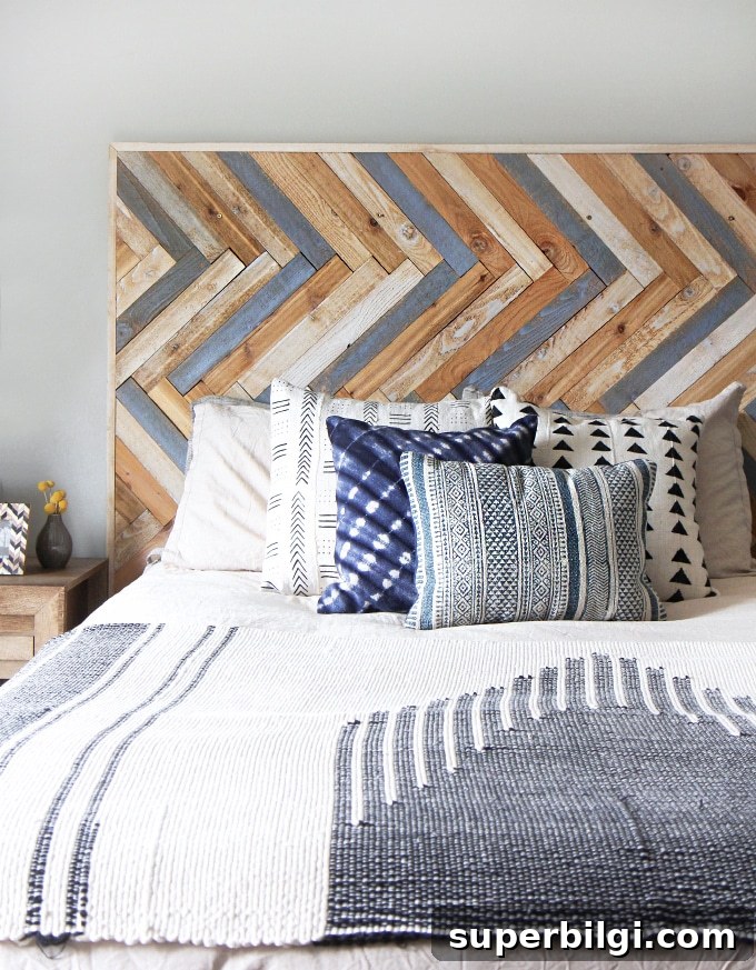 How to Make a Headboard: 13 DIY Ideas to Build Your Own 8 How to make a headboard: 13 Beautiful DIY Headboard Ideas - Herringbone Wood Headboard