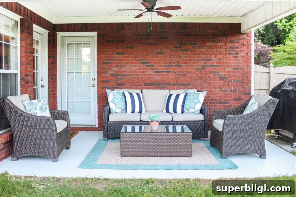 Paint Your Concrete Patio: Prep, Tools and Sealing Tips 8 How to Paint a Concrete Patio - finished patio with chairs and rug