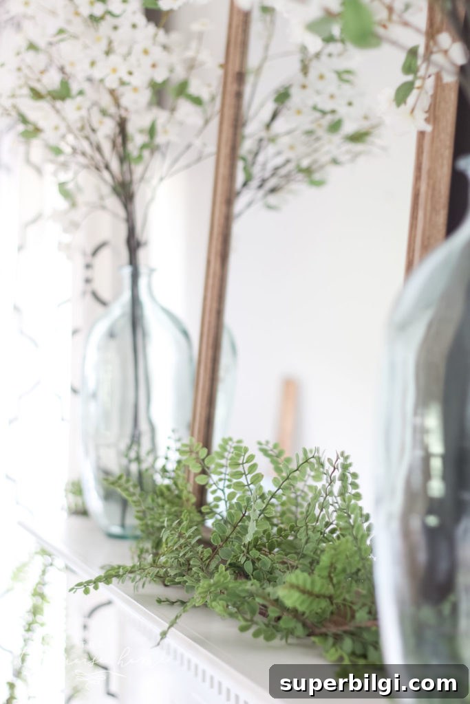 A Simple Summer Mantel - bright green locust garland from Hearth and Home with Magnolia