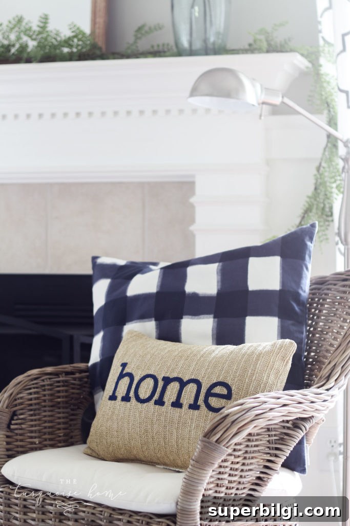A Simple Summer Mantel - "home" pillow with navy and natural colors